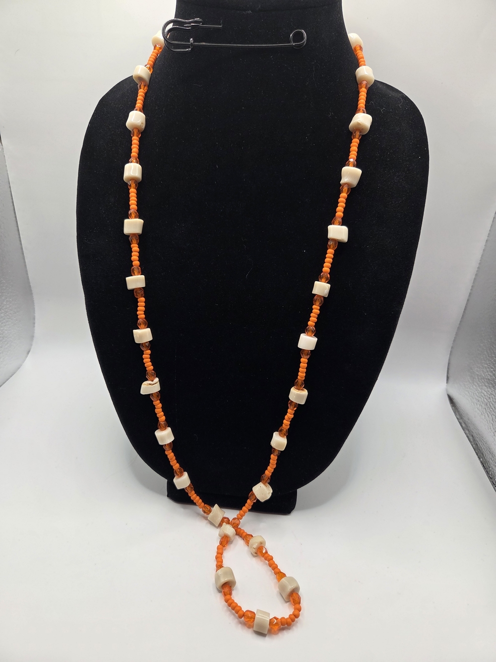 1510. Bone And Orange Beaded Necklace